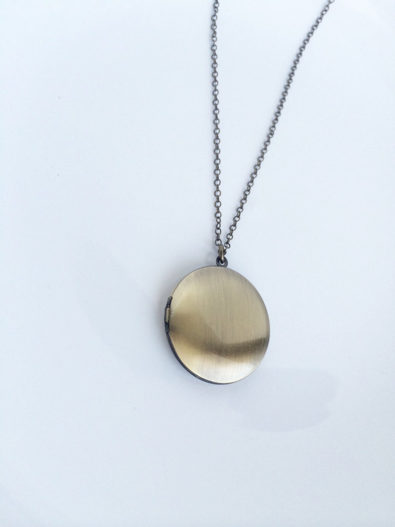 Andromeda \u2022 Round locket necklace