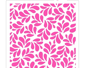 May include: A square, white stencil with a repeating pattern of bright pink teardrop shapes. The stencil has a small tab at the top with a stylized letter "A". The website address "www.bakeartstencils.com" is printed at the bottom.