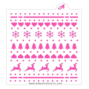 May include: A pink plastic stencil with a Christmas sweater design. The design includes snowflakes, Christmas trees, houses, reindeer, and a repeating pattern of diamonds and squares. The stencil is for use with icing, paint, or other mediums. The text "www.bakeartstencils.com" is printed at the bottom of the stencil.