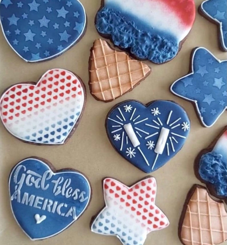 God Bless America stenciled on heart cookies for the 4th of July