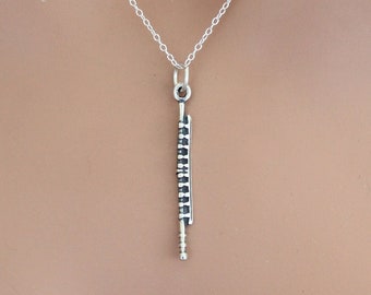 Collar con dije de flauta de plata de ley: joyería musical