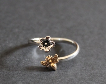 Anillo ajustable de plata de ley con abeja y flor