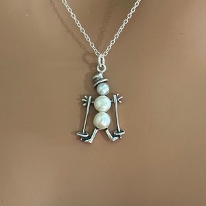 Skiing Snowman Earrings with Three Cultured Freshwater White Pearls Antique Finish Skiing Snowman Earrings with Three Cultured Freshwater White Pearls Antique Finish