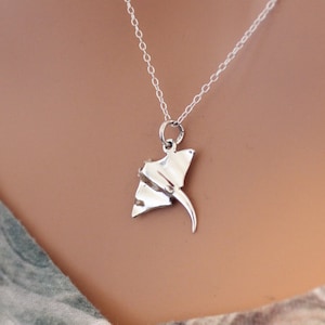 Wave Necklace Beach Jewelry Manta Ray. Manta Ray Jumping Over Ocean Waves Pendant in Sterling Silver on an 18 Inch Cable Chain Wave Necklace Beach Jewelry Manta Ray. Manta Ray Jumping Over Ocean Waves Pendant in Sterling Silver on an 18 Inch Cable Chain
