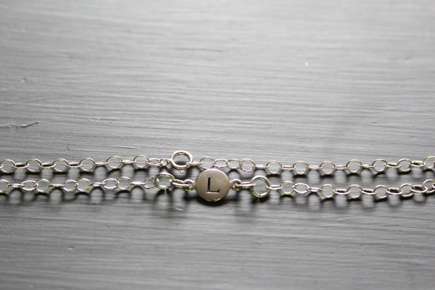 Designer Jewelry CHM11L/BT0615BS L LETTER L on bracelet