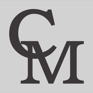 May include: Black and white monogram logo with the letters "CM" intertwined.