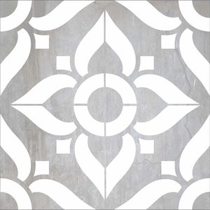 May include: A gray tile with a white geometric pattern. The pattern features a central circle with four curved shapes extending from it, creating a symmetrical design.