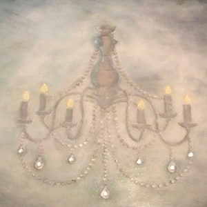 May include: A vintage-style chandelier with a frosted glass center and multiple crystal drops. The chandelier has eight candle-style light bulbs.