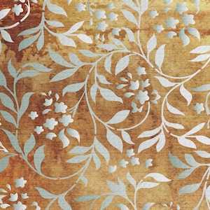 May include: A vintage-style wallpaper design with a repeating pattern of silver leaves and flowers on a brown background.