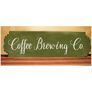 May include: A green wooden sign with the text "Coffee Brewing Co." in white cursive lettering. The sign is on a striped background.