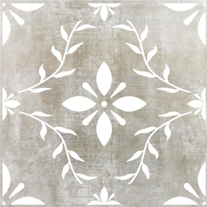 May include: A white floral design on a light brown background. The design features a central flower with four petals and a circle in the center, surrounded by four leaves on each side. The design is repeated in the corners of the square.