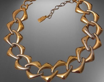 YVES SAINT LAURENT, magnificent vintage necklace in gold-plated metal, PauletteVintage jewelry
