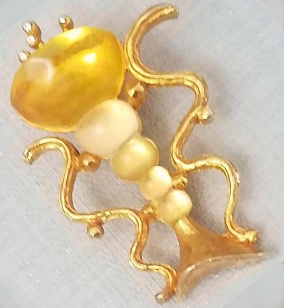 Brooch LORIS AZZARO, resin and gold metal