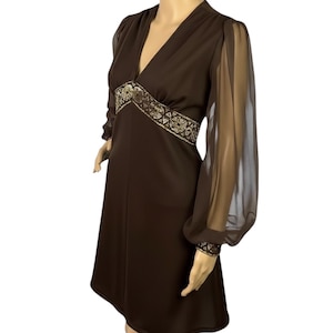 megan draper gold dress Throwback to when Megan Draper decided to be an actress and had to mack on a handsome soap actor (and Don didn't like it ) I played Rod in Season 6,