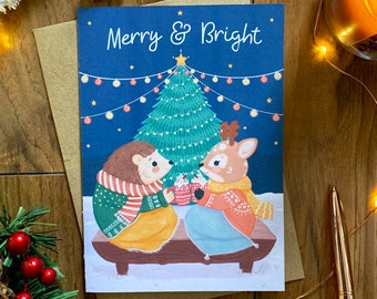 Merry and Bright Illustrated Christmas Card - Winter Woodland Festive Animals - A6 with Kraft Envelope - Hedgehog & Deer with Hot Chocolate