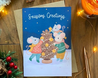Seasons Greetings Illustrated Christmas Card - Winter Woodland Festive Animals - A6 with Kraft Envelope - Mouse Family Decorating a Tree