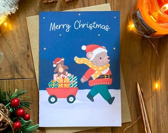 Tarjeta de Navidad Ilustrada de Feliz Navidad - Animales festivos del bosque de invierno - A6 con sobre Kraft - Oso de Santa con regalos