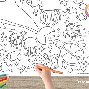 May include: A black and white colouring page featuring a whale, jellyfish, starfish, fish, and turtles. The page has the text "Trace or colour" at the bottom.