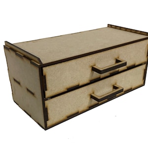 May include: A wooden box with two drawers. The drawers have black handles. The box is made of unfinished wood.