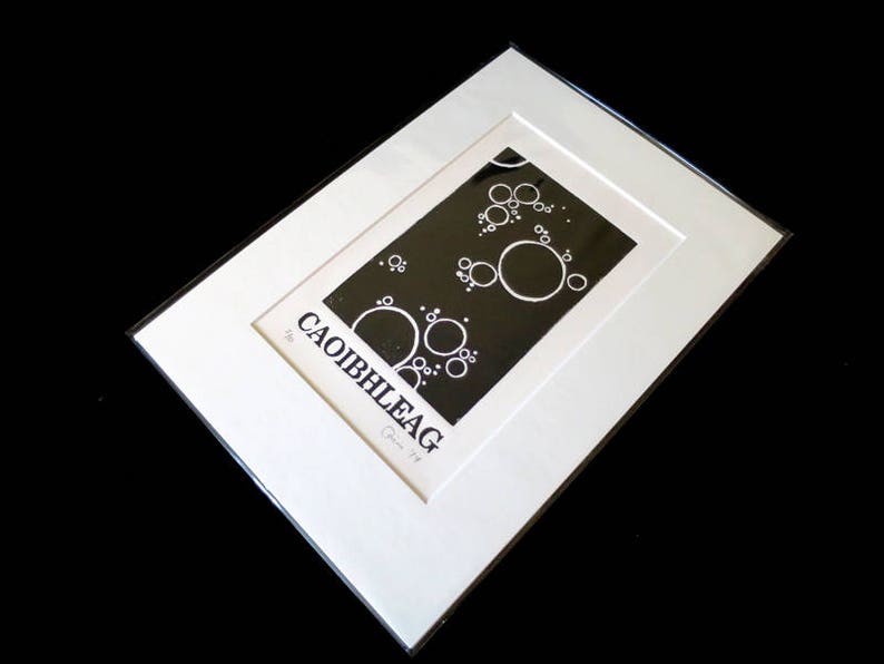 handmade lino print of word collected in South Uist or Eriskay by Father Allan Scottish Gaelic art Caoibhleag unframed. Mounted