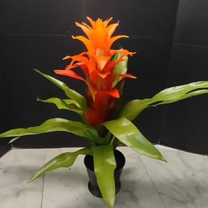 Artificial Bromeliad plant in ceramic pot. ORANGE