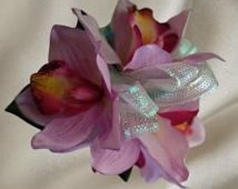 Cute little lavender orchid wrist corsage