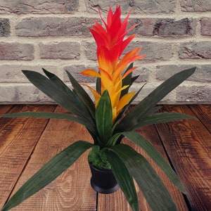 Artificial Bromeliad plant in ceramic pot,  yellow with orange highlights