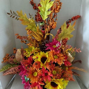 This is a large fall table centerpiece
