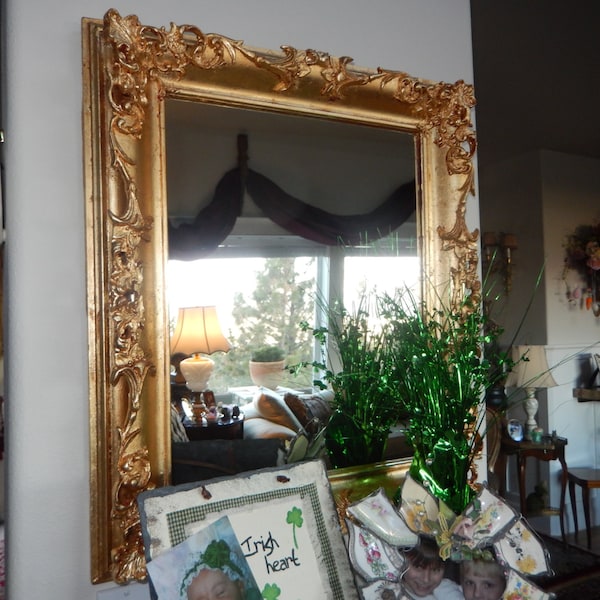 ORNATE ANTIQUE MIRROR