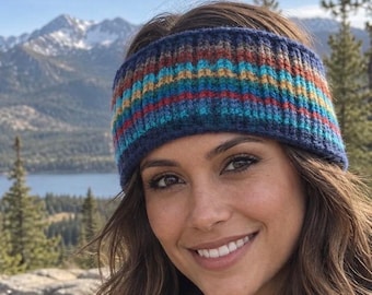 May include: A knitted headband featuring a ribbed texture and a horizontal striped pattern in shades of navy blue, teal, yellow, orange, and red. The accessory is constructed with a thick, warm yarn material and displays a consistent, repeating knit stitch design throughout the entire band.