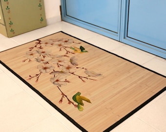 Printed Bamboo Mat, area rug - Oriental print of bird on branch, plum blossom in Green and soft pink. bamboo carpet art mat