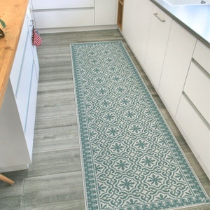 Green vinyl rug runner. Kitchen floor mat with vintage tiles and decorative frame. Spanish tiles design in green. Green vinyl floor mat.