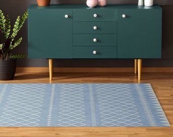 Tapis de sol en vinyle géométrique bleu. Tapis de style Ikat, imprimé sur PVC.