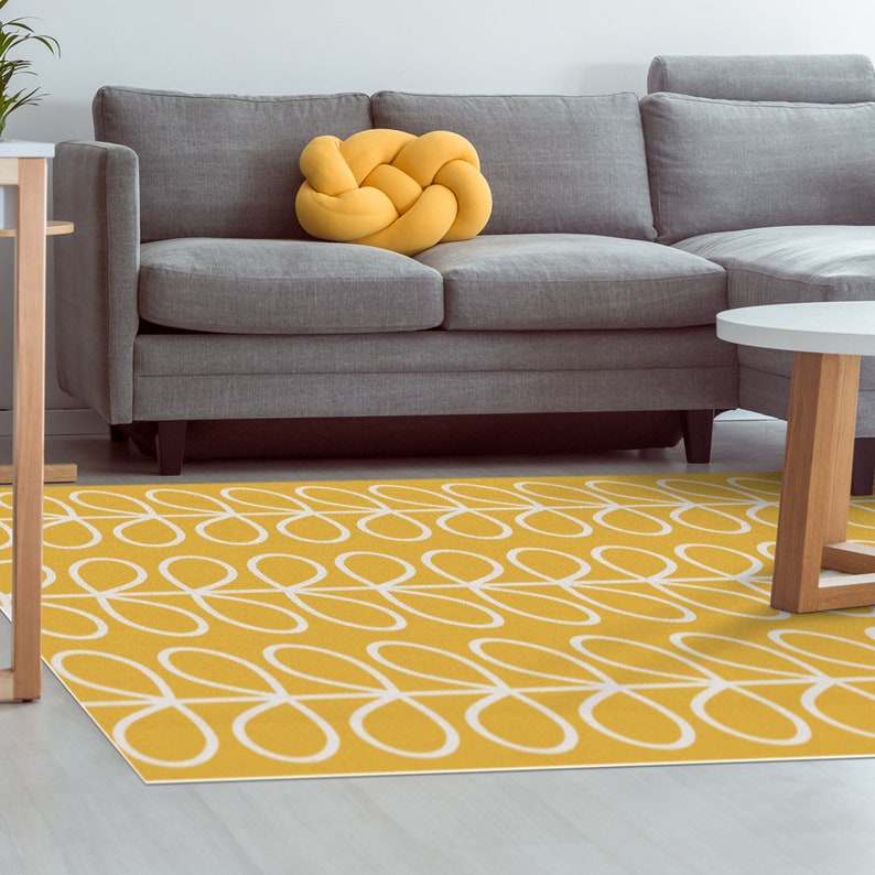 Yellow vinyl floor area rug with graphic leaves design in Etsy