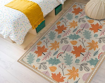 NOUVEAUTÉ - Tapis en vinyle beige Feuilles dans la forêt. Tapis de sol en vinyle beige avec illustration de feuilles colorées et cadre beige. chambre d'enfants.