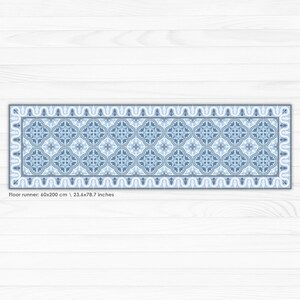 May include: A blue and white patterned floor runner with a geometric design. The runner is 60x200 cm or 23.6x78.7 inches.
