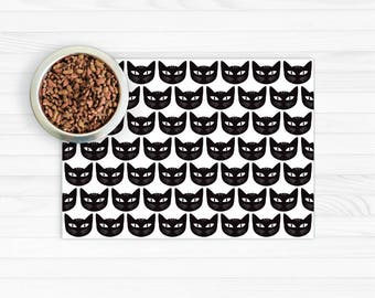 Placemat voor kattenvoer. De kat ziet illustraties in zwart op wit onder ogen. Vinyl kattenmat / placemat voor huisdieren / placemat voor katten / mat voor huisdieren / placemat van vinyl.