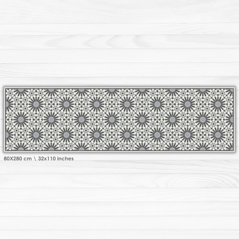 May include: A white and gray patterned runner rug with a geometric design. The rug is 80x280 cm / 32x110 inches.
