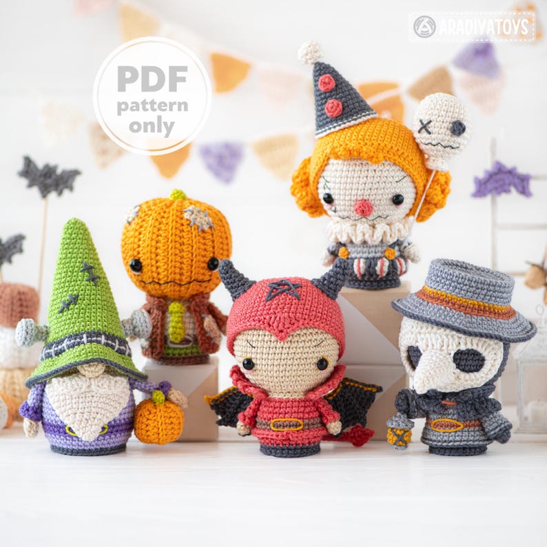 May include: A collection of five crocheted amigurumi figures including a green gnome, an orange pumpkin character, a red devil, a clown with a balloon, and a plague doctor. The image includes the text PDF pattern only and ARADIVATOYS.