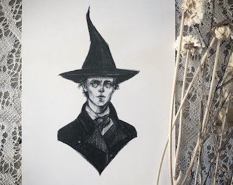 May include: A black and white pencil drawing of a person wearing a black pointed hat and a black coat. The person has short, dark hair and a serious expression.