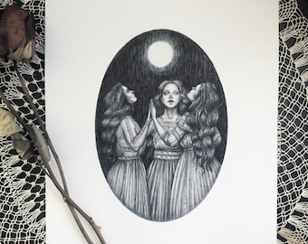 May include: A black and white pencil drawing of three women standing in a circle, looking up at a full moon. The women are wearing long dresses and have long hair. The drawing is set against a dark background.