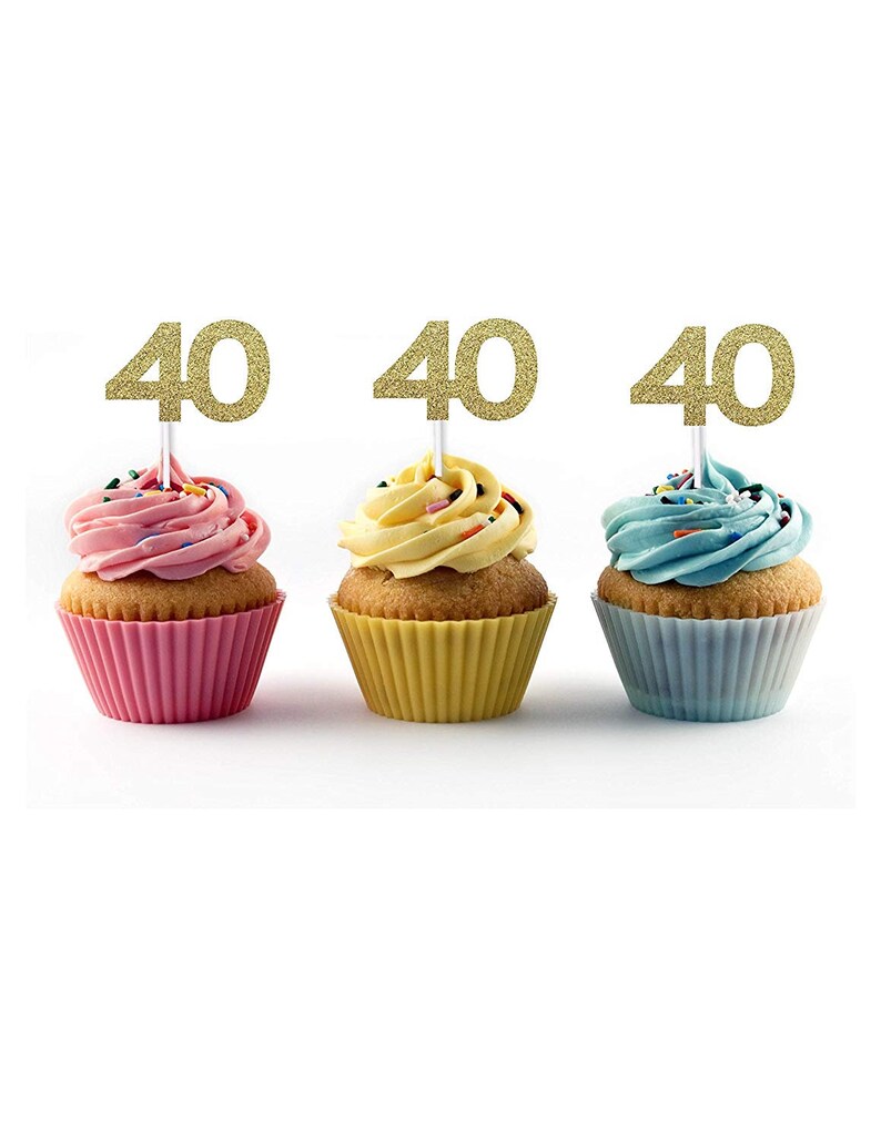 May include: Three cupcakes with pink, yellow, and blue frosting. Each cupcake has a gold glitter '40' topper.