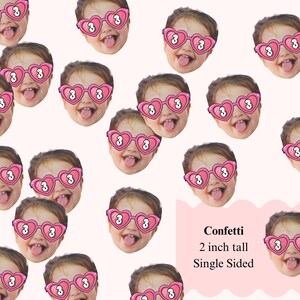 May include: Confetti featuring multiple images of a child wearing pink heart-shaped sunglasses with the number 3. The confetti is 2 inches tall and single-sided, with a light pink background.