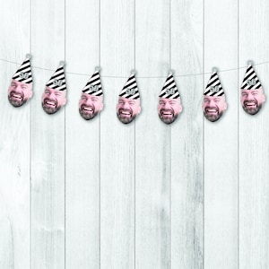 cute 50th birthday face banner with a black and white party hat on top