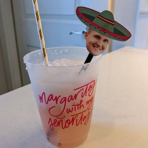 Fiesta drink stirrers with face and green sombrero