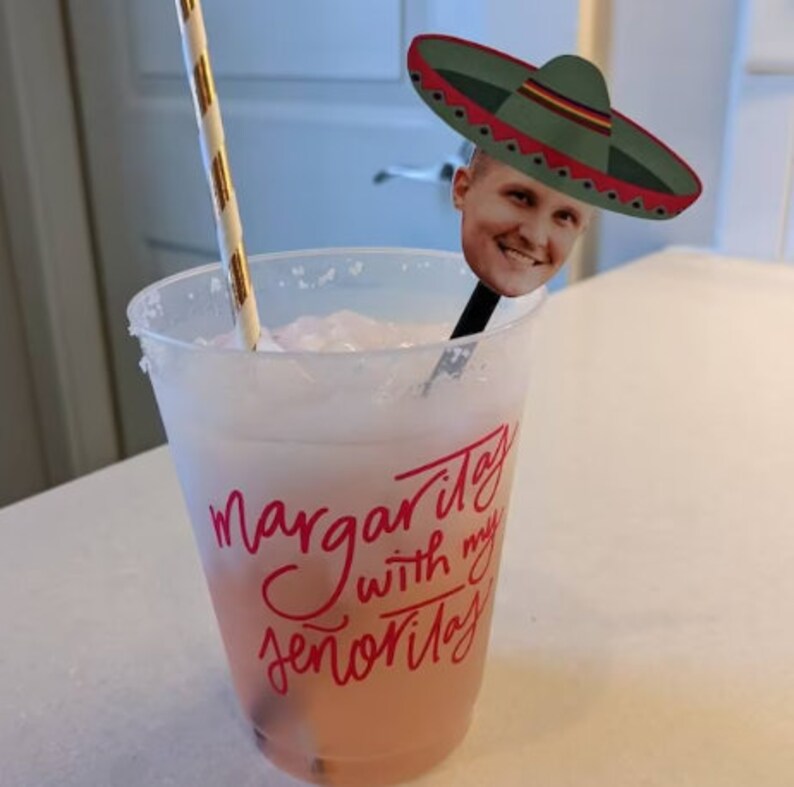 Fiesta drink stirrers with face and green sombrero