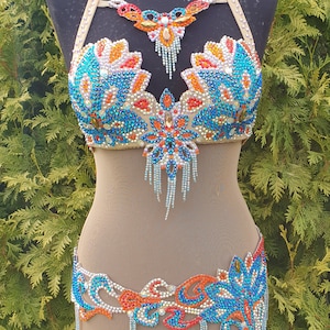 Belly dance costume. Orange-emerald-teal professional belly dance costume, oriental dance costume