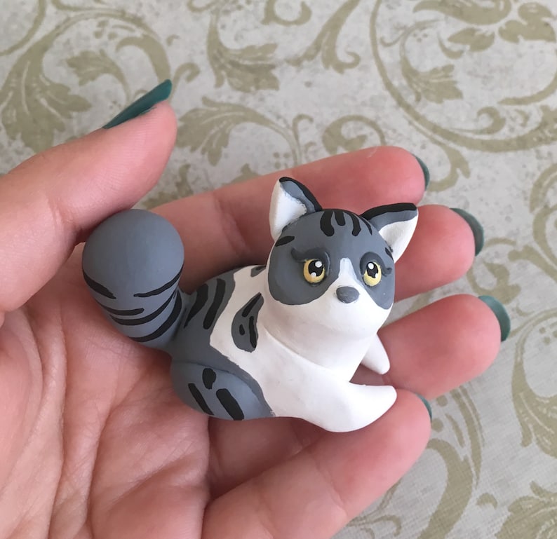 clay cat figurines