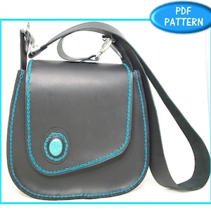 May include: A black leather handbag with a turquoise accent and blue stitching. The bag has a long strap and a flap closure. The image includes the text "the Leather Pattern Store" and "Gala Handbag".