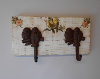 Cast Iron Bird Hooks on Distressed Wooden Board